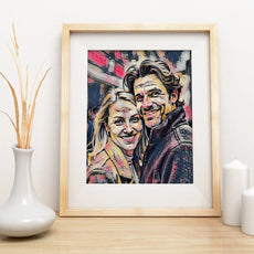 Framed portrait of a smiling couple in an oil painting style artwork